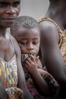 Pygmy woman and child