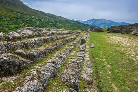 Rows of seats in the stadium of the ruined city of Amantia
