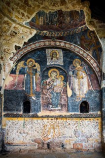 Frescoes with traces of vandalism