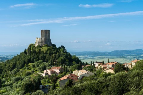 Typical Tuscany landscape in Val d'Orcia with the castle Rocca d'Orcia