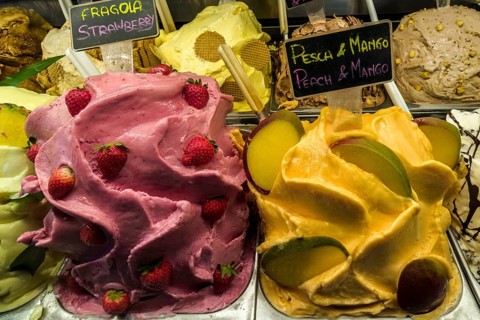 Ice cream is diplayed very appetisingly in a shop
