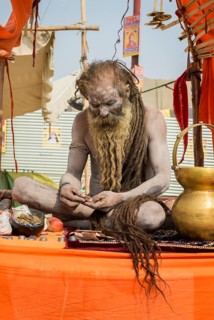 Sadhu covered with white ashes