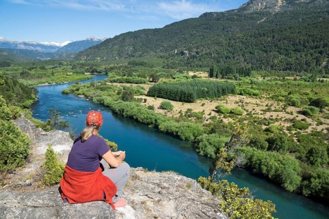 Tourist looking into river valley of Rio Futaleufu