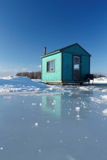 Ice fishing cabin on frozen Saint Lawrence River
