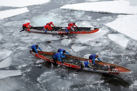 Canoe race challenge over the partly frozen Saint Lawrence River