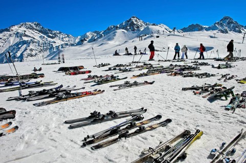 Pairs of skis lying on snow, Les Contamines-Montjoie ski resort