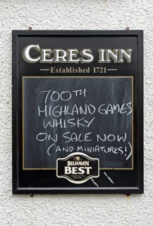 Restaurant sign displaying 700th Highland Games Whiskey