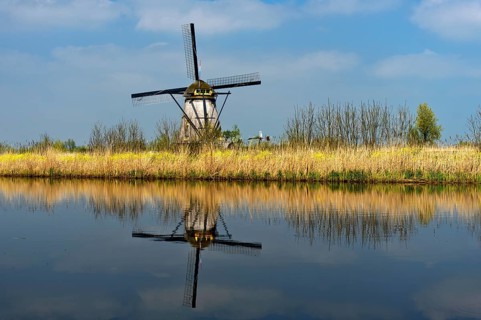 Dutch windmill on a canal
