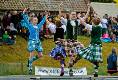 Girls dancing in kilts at the Ceres Highland Games folk dance competition