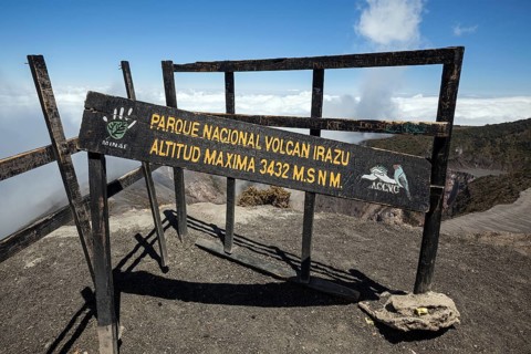 Old wooden shield at the main crater of Irazu Volcano