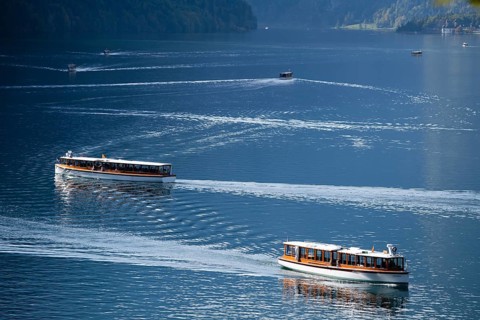 Excursion ships in front of Echowand on Lake Konigssee