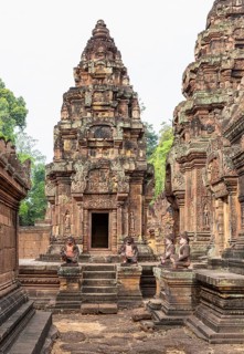 Pancharam towers with guardian figures in Banteay Srei temple