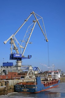 Cargo ship loading sand