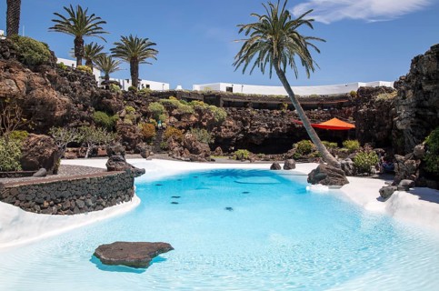 Tropical garden with swimming pool