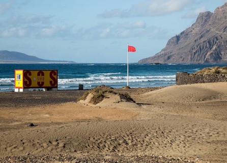 Red flag flying warning of bathing danger