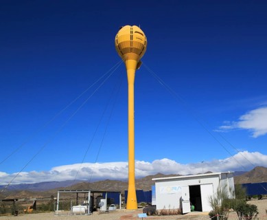 Heliostats reflecting sunrays to receiver tower