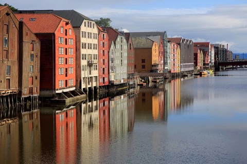 Historic waterside warehouse buildings on River Nidelva