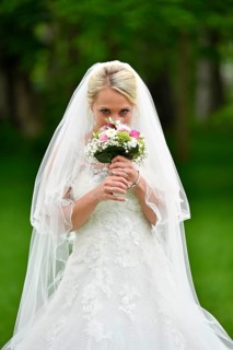 Bride in wedding dress with veil