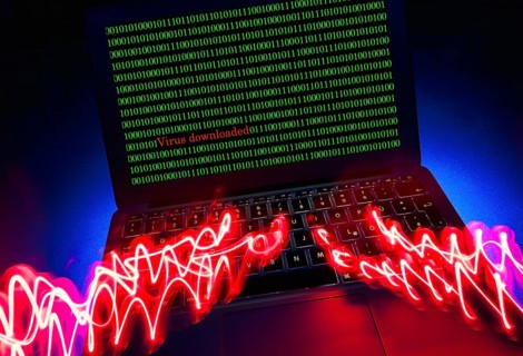 Laptop with skull and crossbones on screen