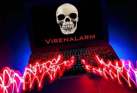 Laptop with skull and crossbones on screen