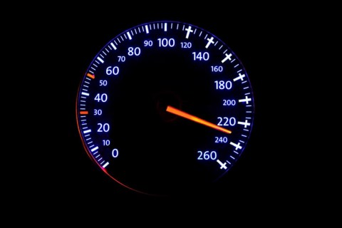 Speedometer with speed display 220 km/h and crosses from 120 km/h