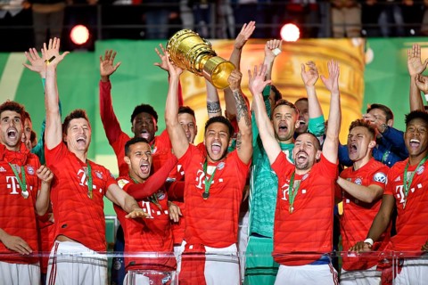 Corentin Tolisso FC Bayern Munich with cup