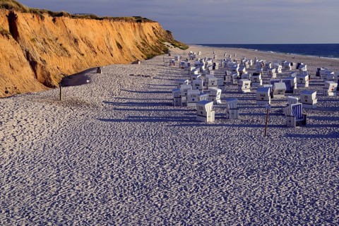 Beach and beach chairs at red cliff