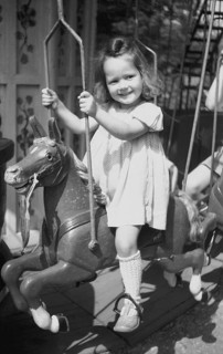 Girl drives carousel