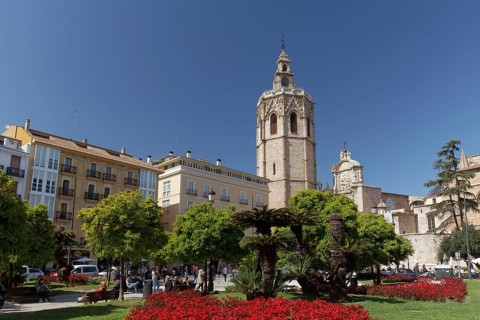 Placa de la Reina with cathedral of Valencia with church tower Micalet