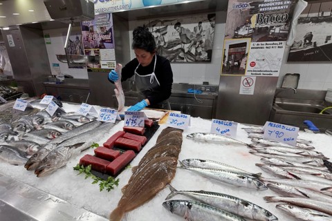 Fish stall saleswoman