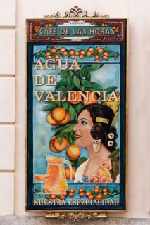 Advertising board for the cocktail Agua de Valencia at a cafe