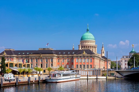 excursion boat in front of Parliament Potsdam and St. Nicholas Church