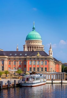 excursion boat in front of Parliament Potsdam and St. Nicholas Church