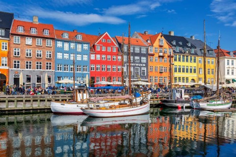 Coloured houses and sailing boats on Nyhavn canal