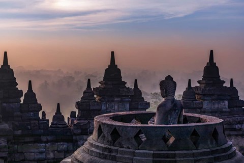 Buddha statue at sunrise