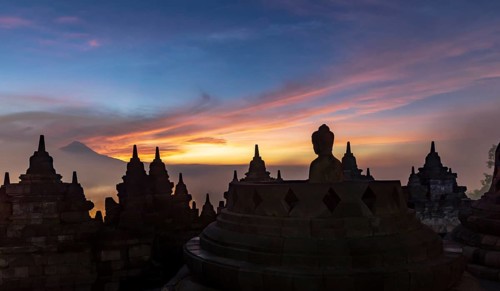 Buddha statue at sunrise
