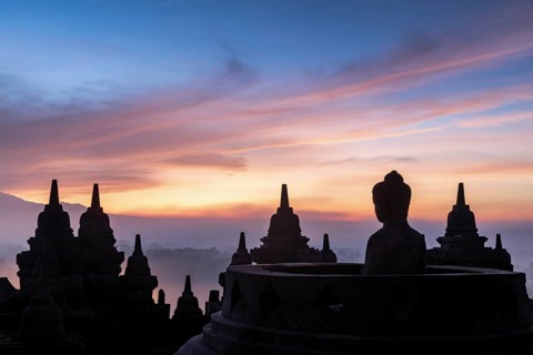 Buddha statue at sunrise
