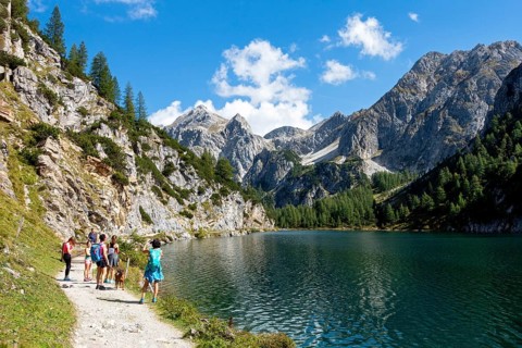 Hikers at the mountain lake