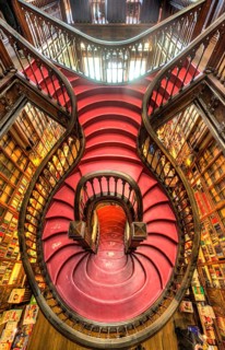 Curved wooden staircase in library