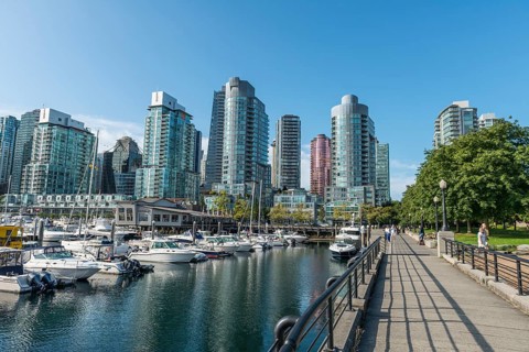 High-rise buildings on the promenade with marina