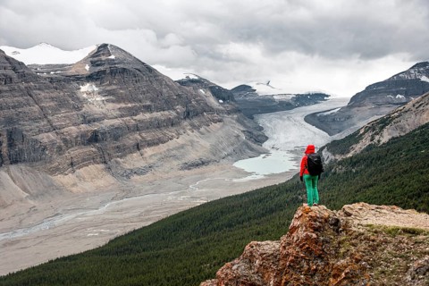 Hiker standing on a rock