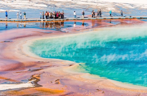 Tourists on a jetty in the thermal area