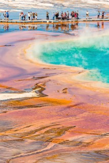 Tourists on a jetty in the thermal area