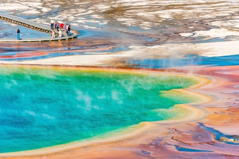 Tourists on a jetty in the thermal area