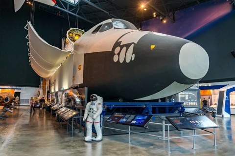Space Shuttle and an astronaut in a space suit