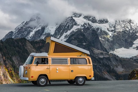Old VW Bus T2 with opened roof