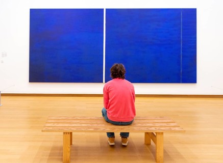 Man looking at modern art