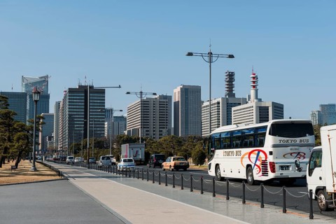 Dense traffic in front of skyscrapers