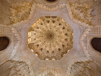 Arabesque Moorish stalactites or muqarnas in the hall Sala de los Abencerrajes