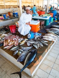Merchant with various fish